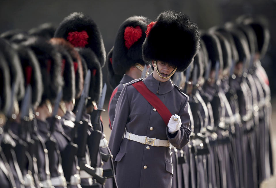 Members of the Number 7 Company of the Coldstream Guards on parade at Horse Guards Parade in London, Tuesday Nov. 22, 2022, ahead of the state visit of South African President Cyril Ramaphosa. (Yui Mok/Pool via AP)