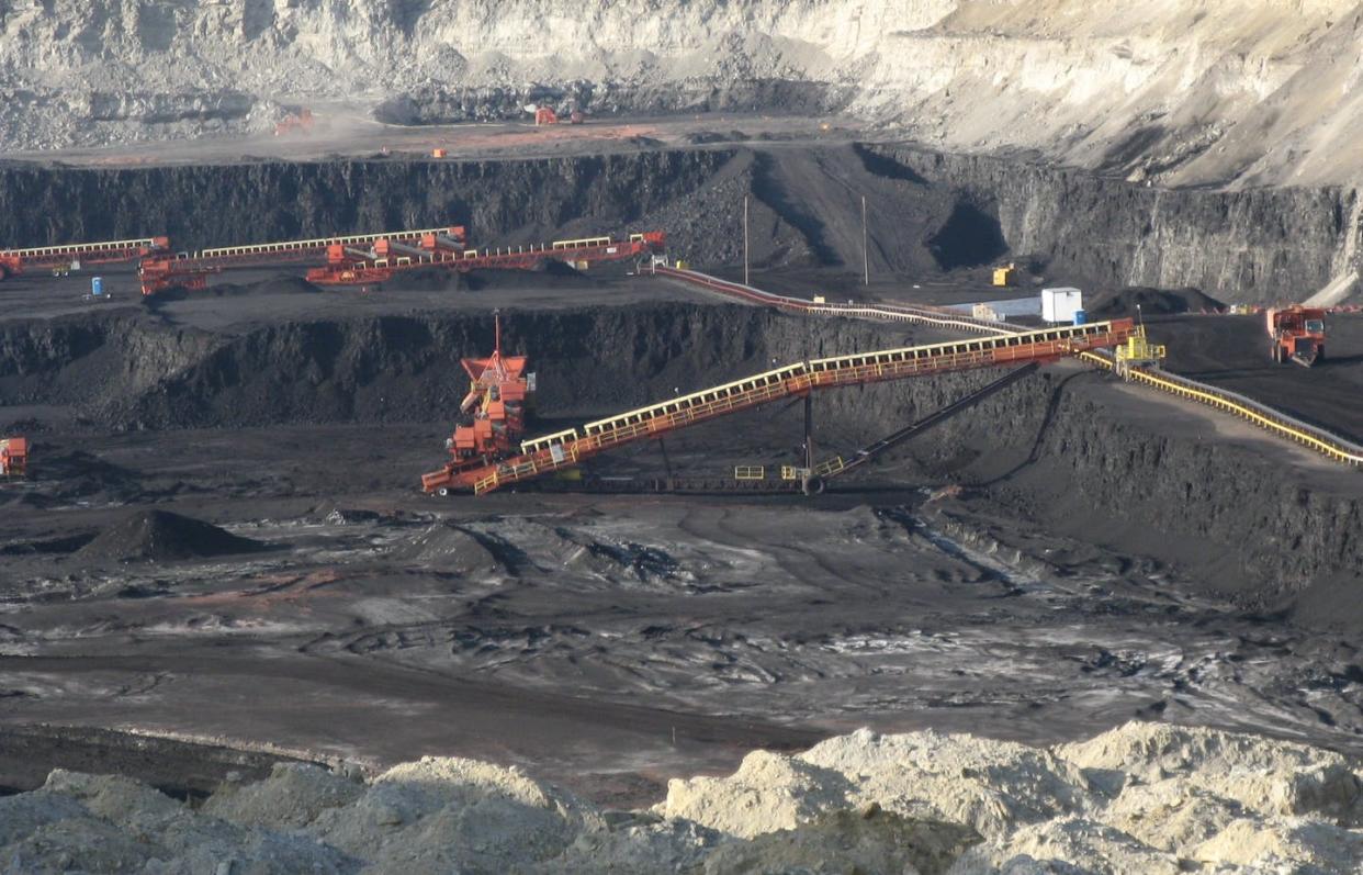 <span class="caption">A surface coal mine in Gillette, Wyoming, photographed in 2008.</span> <span class="attribution"><a class="link " href="https://flic.kr/p/cD3NJU" rel="nofollow noopener" target="_blank" data-ylk="slk:Greg Goebel/Flickr;elm:context_link;itc:0;sec:content-canvas">Greg Goebel/Flickr</a>, <a class="link " href="http://creativecommons.org/licenses/by-sa/4.0/" rel="nofollow noopener" target="_blank" data-ylk="slk:CC BY-SA;elm:context_link;itc:0;sec:content-canvas">CC BY-SA</a></span>