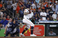 Houston Astros pinch hitter J.J. Matijevic, right, watches his walkoff RBI single off New York Yankees relief pitcher Michael King during the ninth inning in the first game of a baseball doubleheader Thursday, July 21, 2022, in Houston. (AP Photo/Kevin M. Cox)