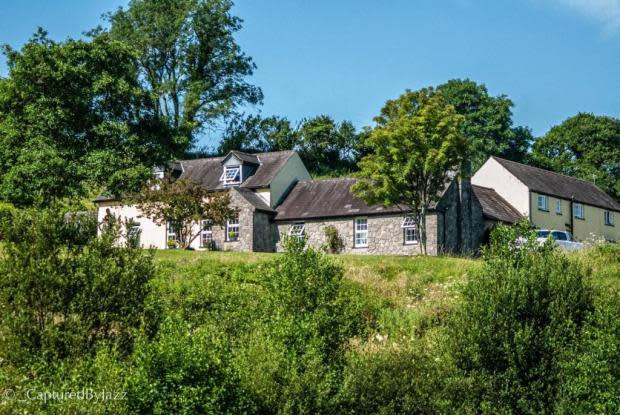 Western Telegraph: The exterior of the property. Picture: John Francis, Tenby