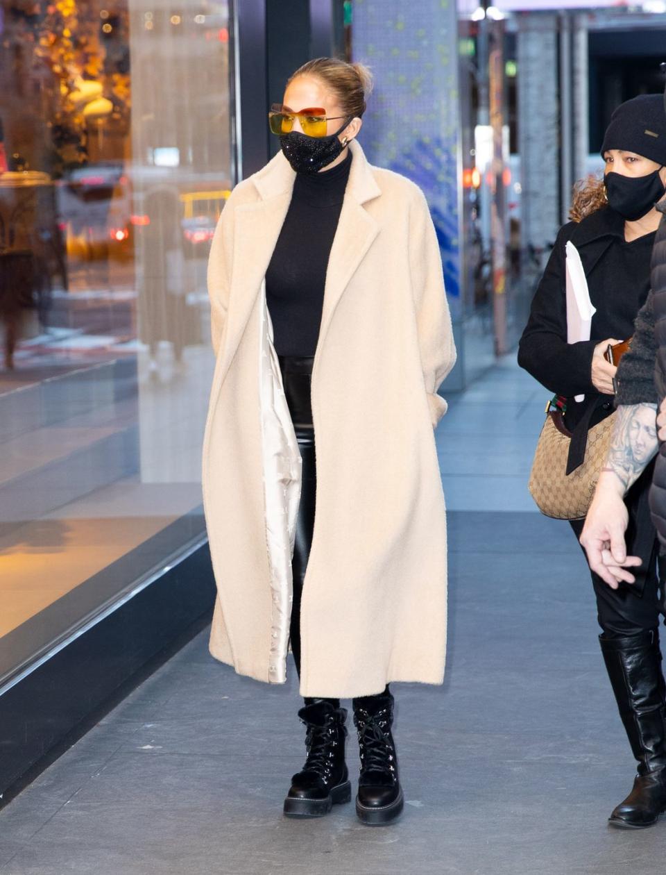 <p>The 51-year-old was photographed enjoying a spot of Christmas shopping on December 8.</p><p>For the outing, the singer wore a pair of black combat boots, skin-tight leggings, a camel-coloured long coat and orange-tinted sunglasses. She also wore a black face mask.</p><p><a class="link " href="https://www.elle.com/uk/fashion/what-to-wear/articles/g31087/best-camel-coats-to-buy-now-high-street-topshop-mango-warehouse/" rel="nofollow noopener" target="_blank" data-ylk="slk:SHOP CAMEL COATS;elm:context_link;itc:0;sec:content-canvas">SHOP CAMEL COATS</a></p>