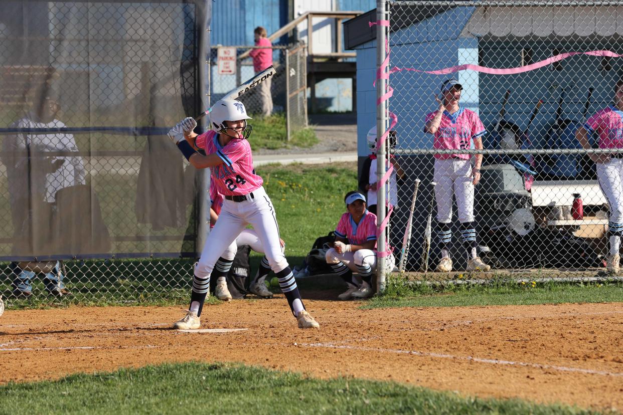 John Jay's Lyla Dwyer awaits a pitch from Carmel during John Jay's "Pink Out" softball game on May 1, 2024. The event raised money for Miles of Hope Breast Cancer Foundation.