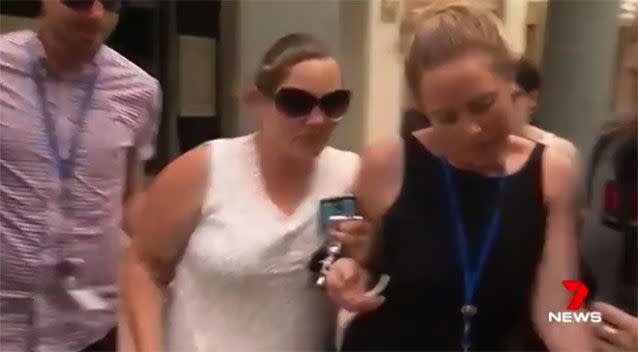 Nikki's mother is rushed from court. Source: 7News