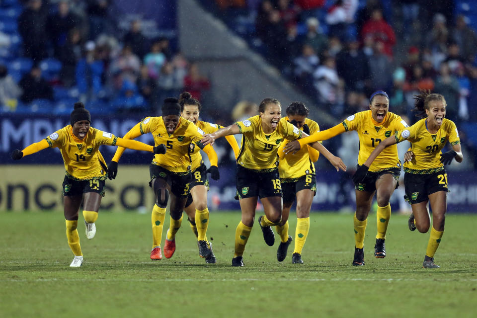 Jamaica celebrate after beating Panama to reach their first Women’s World Cup. (Photo by Omar Vega/Getty Images)