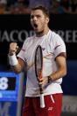 Stanislas Wawrinka of Switzerland celebrates winning the third set in his men's singles semi-final match against Tomas Berdych of the Czech Republic at the Australian Open 2014 tennis tournament in Melbourne January 23, 2014. REUTERS/Jason Reed