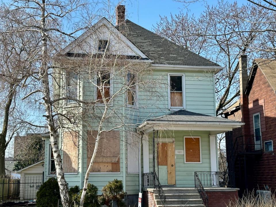 The three-story house at 663 Marentette Ave. in Windsor, categorized as a "legal non-compliant" lodging home under city zoning.