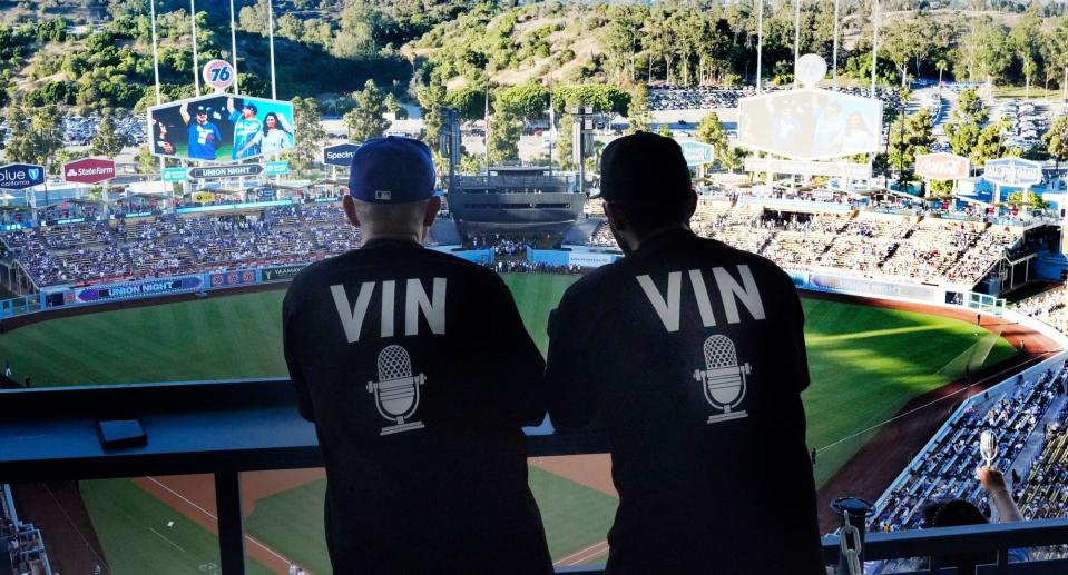 Los Angeles, CA - August 05: Vin Scully fans look on as the Los Angeles Dodgers celebrate the life of Hall of Fame broadcaster Vin Scully who passed away Tuesday night at the age of 94 prior to a MLB baseball game between the Los Angeles Dodgers and the San Diego Padres at Dodger Stadium in Los Angeles on Friday, August 5, 2022. (Photo by Keith Birmingham/MediaNews Group/Pasadena Star-News via Getty Images)