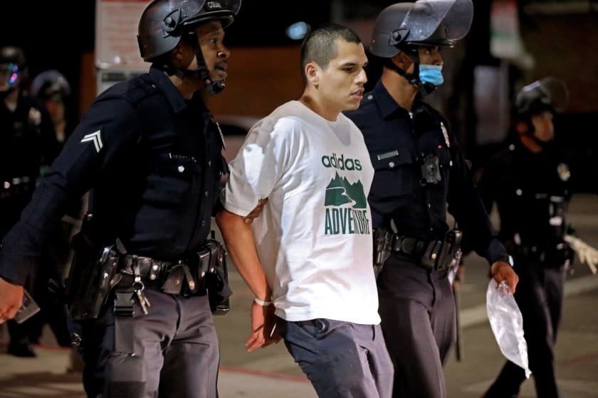 LOS ANGELES, CA - JUNE 01: Protestors arrested for violating curfew at Sunset Blvd and Cahuenga Blvd in Hollywood on Monday, June 1, 2020 in Los Angeles, CA. (Gary Coronado / Los Angeles Times)