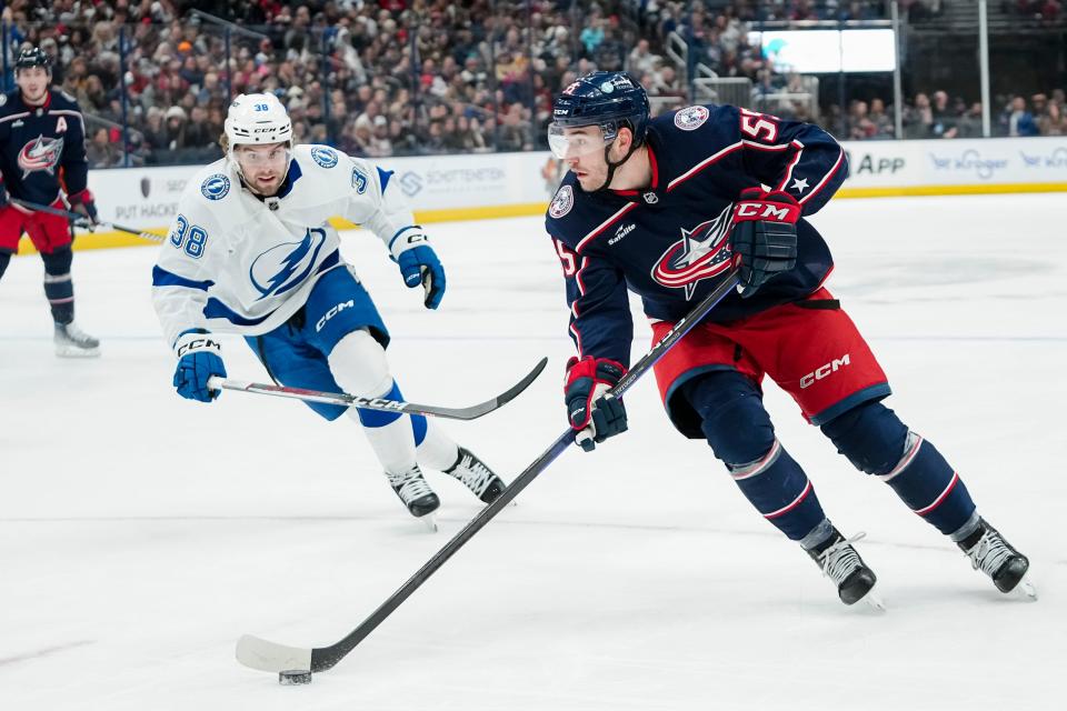 Nov 1, 2023; Columbus, Ohio, USA; Columbus Blue Jackets defenseman David Jiricek (55) skates around Tampa Bay Lightning left wing Brandon Hagel (38) during the first period of the NHL hockey game at Nationwide Arena.