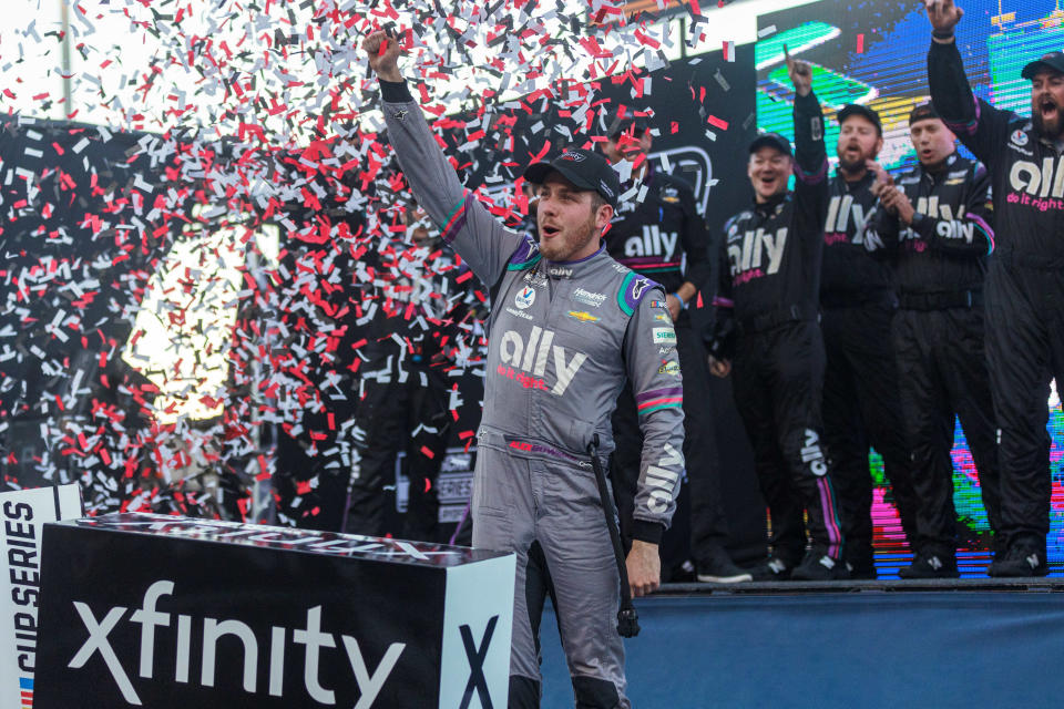 Alex Bowman celebrates after winning the NASCAR Cup Series playoff race at Martinsville Speedway on OCt. 31, 2021. Ryan Hunt/USA TODAY Sports