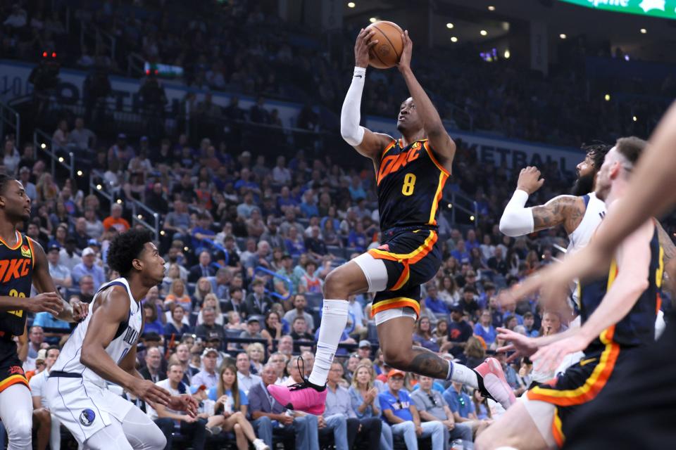Thunder forward Jalen Williams (8) goes to the basket during a 135-86 win against the Mavericks on Sunday at Paycom Center in the regular-season finale.