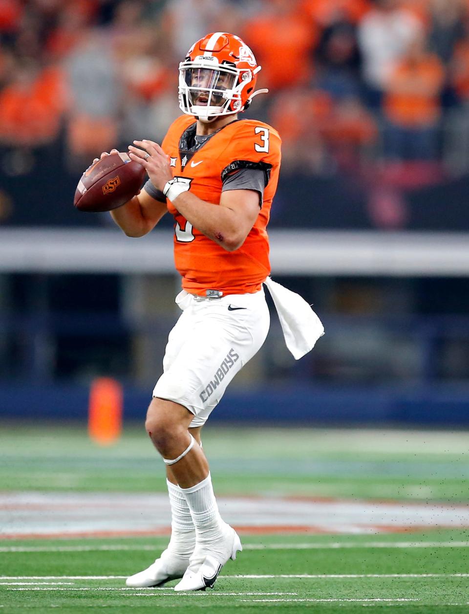 Oklahoma State's Spencer Sanders (3) looks to throw in the fourth quarter during the Big 12 Football Championship Game between the Oklahoma State Cowboys and the Baylor Bears at AT&T Stadium in Arlington, Texas,  Saturday, Dec. 4, 2021. 