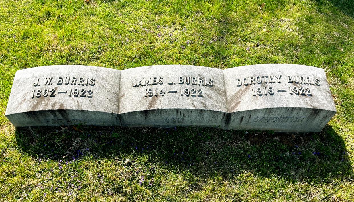 J. William Burris and his two young children were buried across two gravesites in Fernwood Cemetery after they had been killed in a car-train collision in Haubstadt, Indiana. The 1922 wreck also killed his sister and her young daughter.