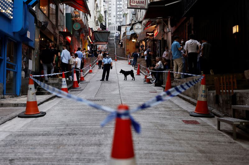 FILE PHOTO: Police keeps watch in the Soho nightlife area in Hong Kong