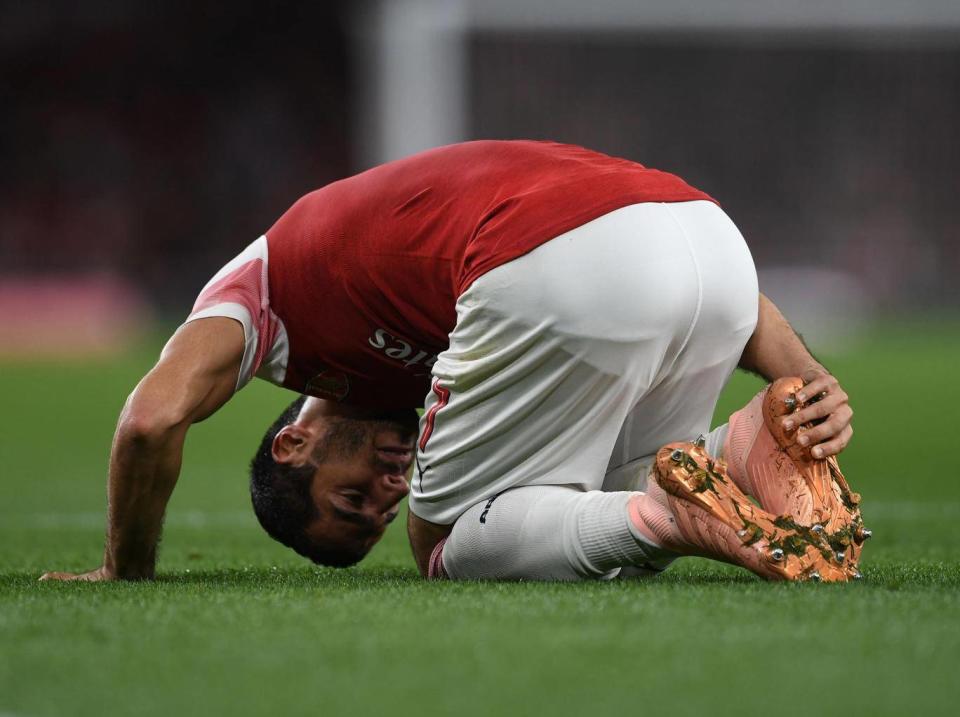 Henrikh Mkhitaryan picked up a knock during the win (Arsenal FC via Getty)