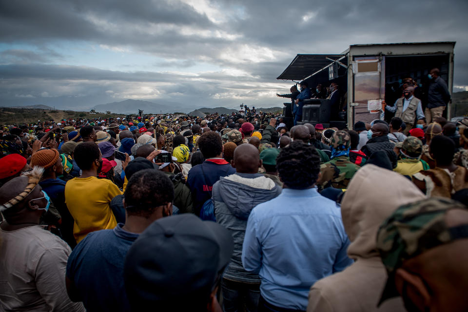 Former president Jacob Zuma addresses his supporters at his home in Nkandla, KwaZulu-Natal Natal Province, Sunday, July 4, 2021. The Constitutional Court will hear Zuma's urgent application on July 12 to rescind its order sentencing him to jail for 15 months for contempt of court. Zuma was initially supposed to hand himself over to authorities for his incarceration by Sunday. (AP Photo/Shiraaz Mohamed)