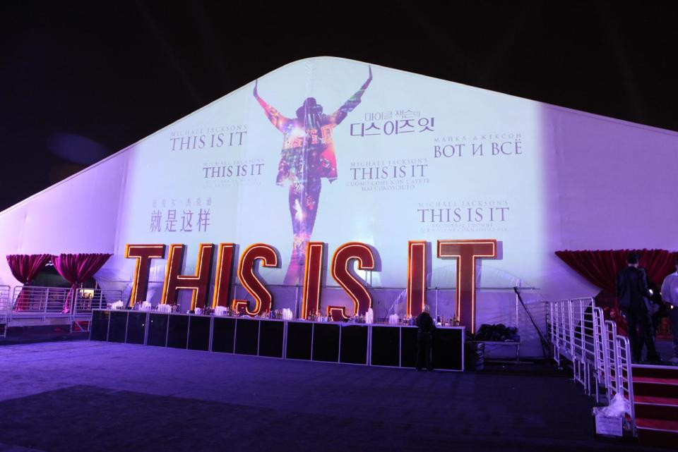 FILE - This Oct. 27, 2009 file photo shows atmosphere at Columbia Pictures' Premiere of Michael Jackson's "This Is It" at the Nokia Theatre L.A. Live, in Los Angeles. Jurors hearing a case filed by Katherine Jackson over her son Michael’s death have received a behind-the-scenes look at the superstar’s troubles off-camera as he prepared for his ill-fated comeback shows. The panel was reminded on Thursday, Aug. 8, 2013, of statements describing the “Thriller" singer as deteriorating and slow to pick up material for the shows that would heavily feature the hits that made him famous, but defense attorneys for concert promoter AEG Live LLC say the “This Is It” footage is an accurate portrayal of his preparations and doesn’t show Jackson in decline. (Photo by Eric Charbonneau/Invision/AP Images, File)