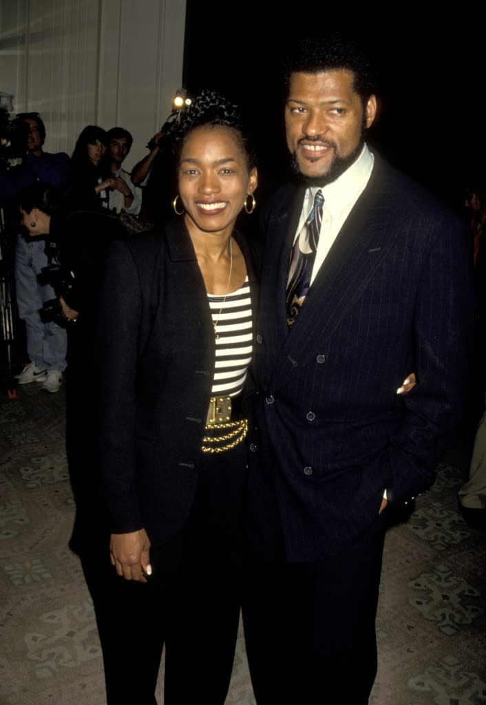 Angela Bassett and Laurence Fishburne during 31st Annual Publicists Guild of America Awards Luncheon at Beverly Hills Hilton Hotel in Beverly Hills, California, United States. (Photo by Ron Galella/Ron Galella Collection via Getty Images)