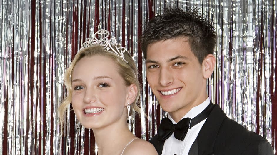 a man and woman posing for a picture