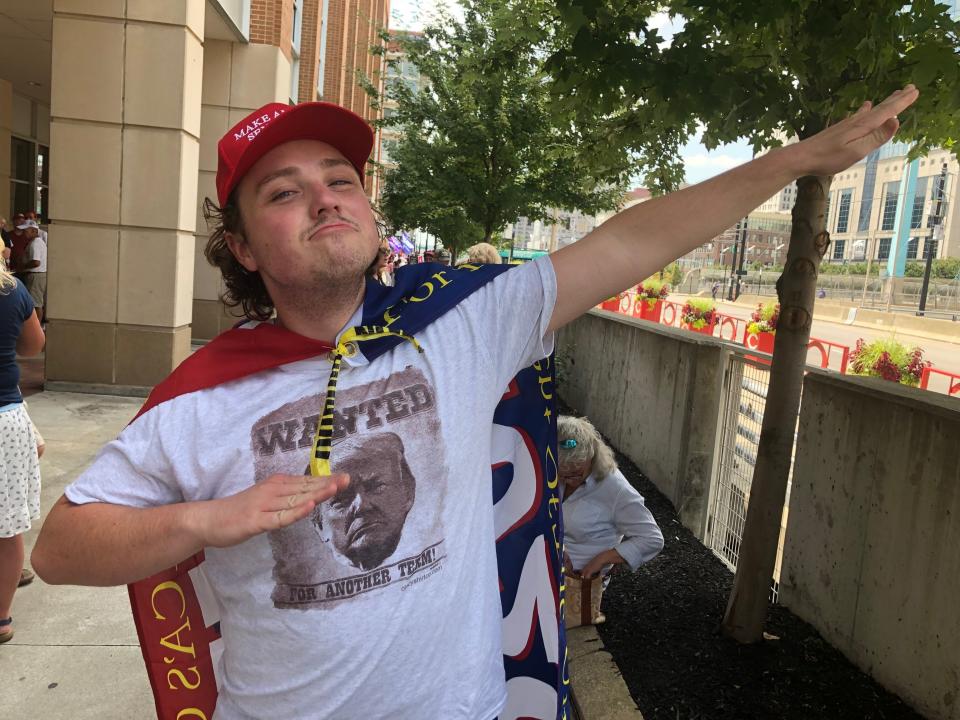 Austin Greg poses for a photo outside a Trump rally in Cincinnati on Aug. 1, 2019. (Photo: Christopher Mathias / HuffPost)