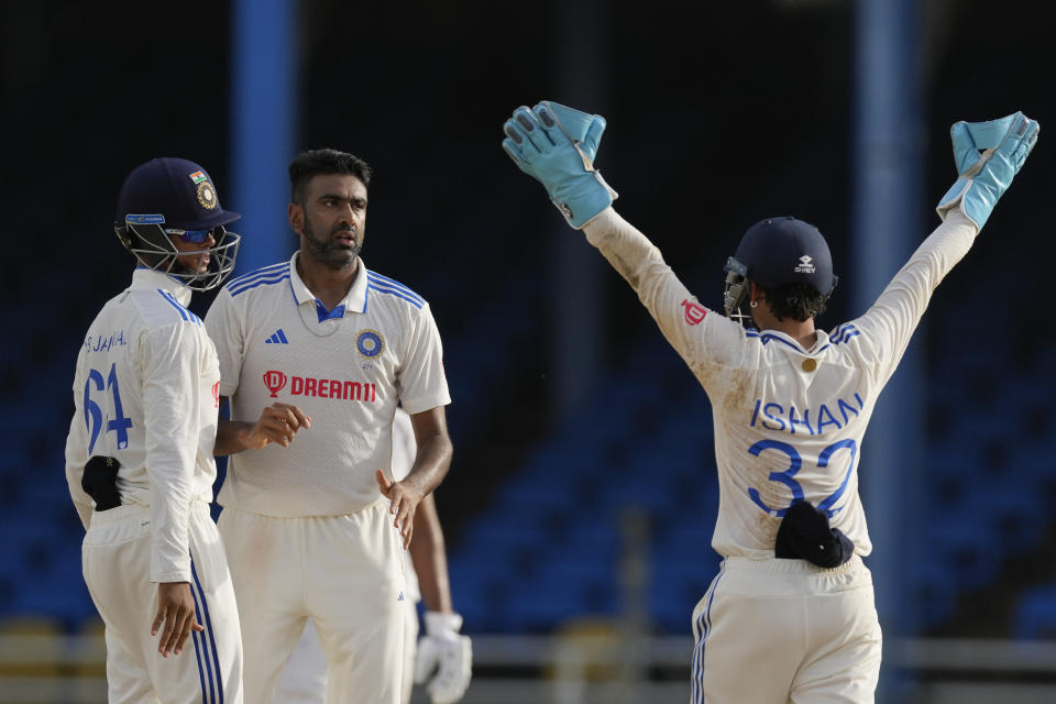 India's Ravichandran Ashwin, second from left, celebrates the dismissal LBW of West Indies' Kirk McKenzie on day four of their second cricket Test match at Queen's Park in Port of Spain, Trinidad and Tobago, Sunday, July 23, 2023. (AP Photo/Ricardo Mazalan)