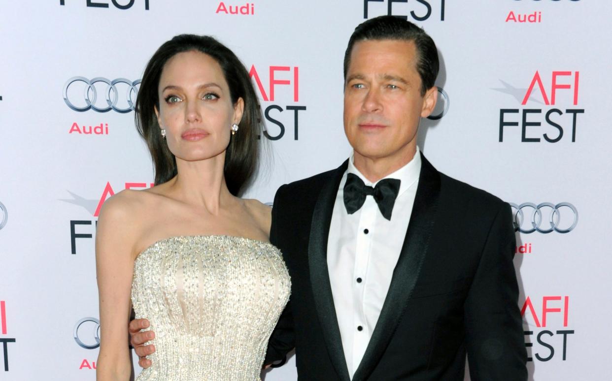 Angelina Jolie told FBI Brad Pitt 'grabbed her head' during private jet fight - Richard Shotwell /Invision