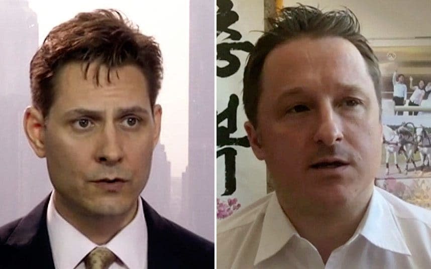 Michael Kovrig, left, and Michael Spavor - AP