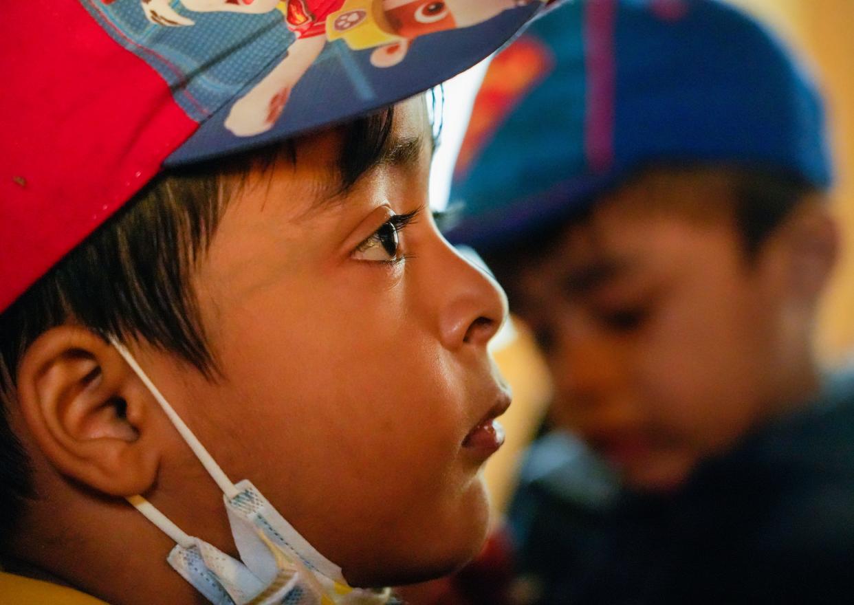 Mohamad Adam, 5, watches Sesame Street in the Rohingya language with 6-year-old Rohingya twin characters named Aziz and Noor Saturday, Oct. 15, 2022, at the Burmese Rohingya Community of Wisconsin in Milwaukee.