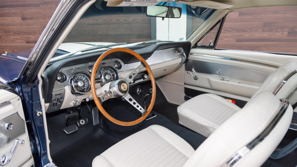 The interior of a 1967 Shelby G.T.500 muscle car.