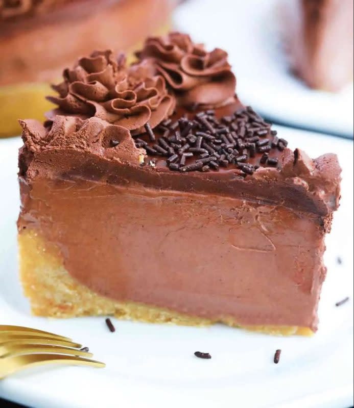 <p>Sweet and Savory Meals</p><p>No-Bake Chocolate Cheesecake made with cream cheese, cocoa powder, whipped cream and lots of melted chocolate is the ultimate indulgent dessert.</p><p><strong>Get the recipe: </strong><a href="https://sweetandsavorymeals.com/no-bake-chocolate-cheesecake/" rel="nofollow noopener" target="_blank" data-ylk="slk:No-Bake Chocolate Cheesecake;elm:context_link;itc:0;sec:content-canvas" class="link rapid-noclick-resp"><strong>No-Bake Chocolate Cheesecake</strong></a></p>