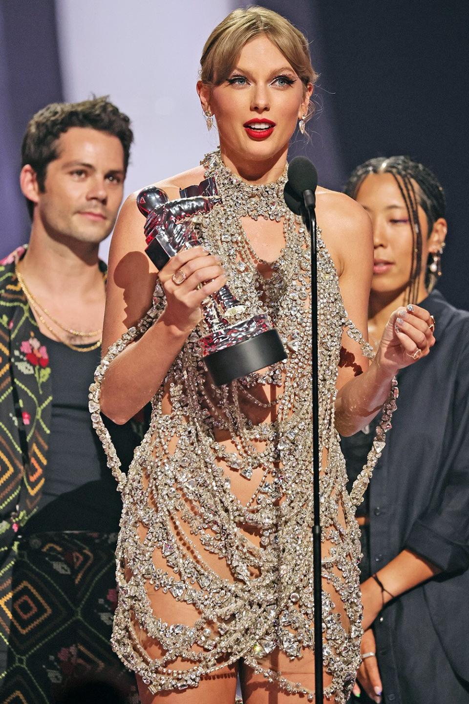 NEWARK, NEW JERSEY - AUGUST 28: Taylor Swift accepts the Video of the Year award for “All Too Well” (10-minute Taylor’s Version) onstage at the 2022 MTV VMAs at Prudential Center on August 28, 2022 in Newark, New Jersey. (Photo by Theo Wargo/Getty Images for MTV/Paramount Global)