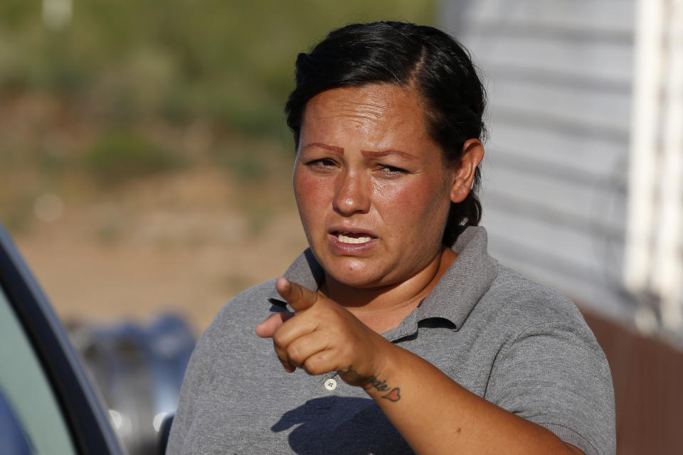 FILE - In this Sept. 2, 2019, file photo, Rocio Gutierrez, a neighbor of Seth Ator, the gunman in a West Texas rampage Saturday, talks during an interview near Odessa, Texas. Gutierrez says that Ator was "a violent, aggressive person" that would shoot at animals, mostly rabbits, at all hours of the night. (AP Photo/Sue Ogrocki, File)