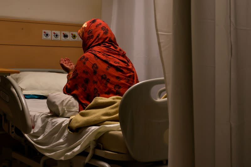 Medical workers treat patients infected with the coronavirus disease (COVID-19) at a hospital in New Delhi