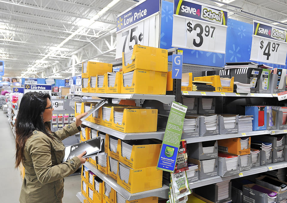 SCARBOROUGH, ME - AUGUST 20: Sarah Patten of Portland, a student at USM, shops for back to school items for herself and a seven-year-old she nannies for at Walmart in Scarborough. (Photo by Gordon Chibroski/Portland Press Herald via Getty Images)