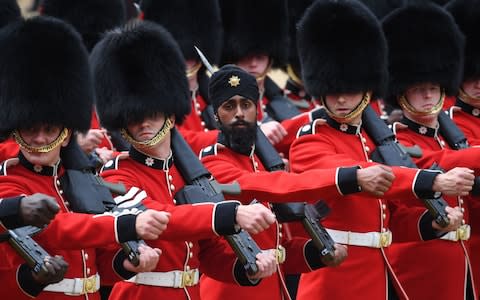 Coldstream Guards soldier Charanpreet Singh Lall wearing a turban during a rehearsal for Trooping the Colour - Credit: Stefan Rousseau /PA