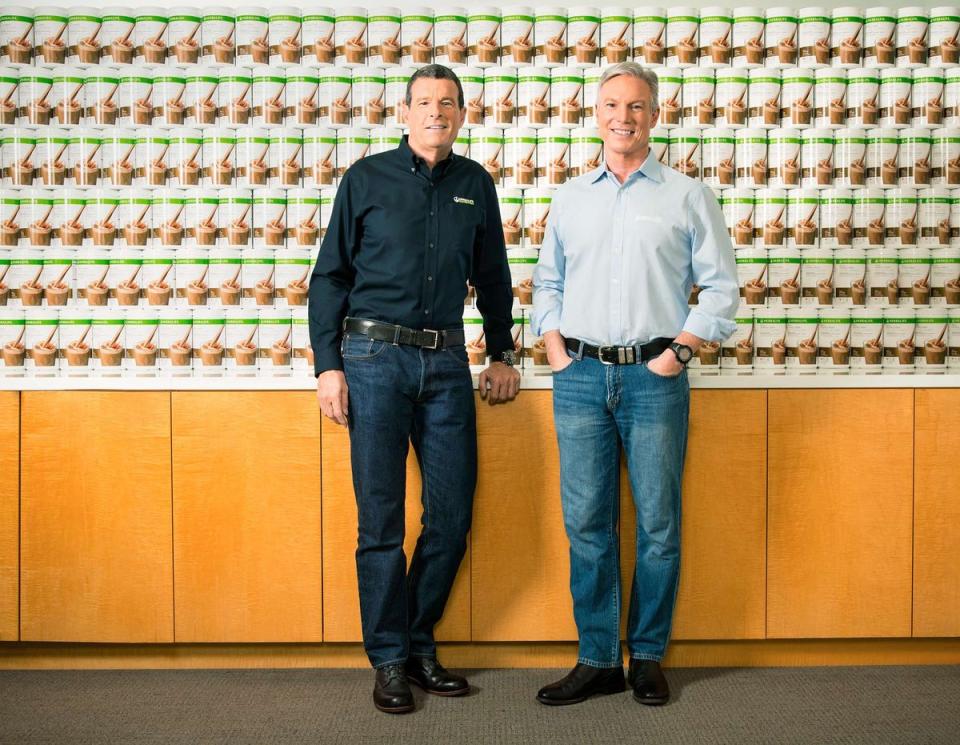 Herbalife CEO Richard Goudis (right) pictured alongside former CEO and now executive chairman Michael Johnson (left).