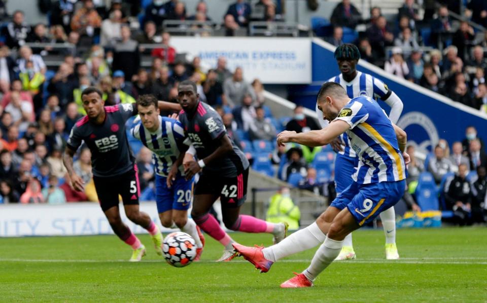 Neal Maupay of Brighton & Hove Albion scores their side's first goal from the penalty spot during the Premier League match between Brighton & Hove Albion and Leicester City at American Express Community Stadium on September 19, 2021 in Brighton, England. - GETTY IMAGES