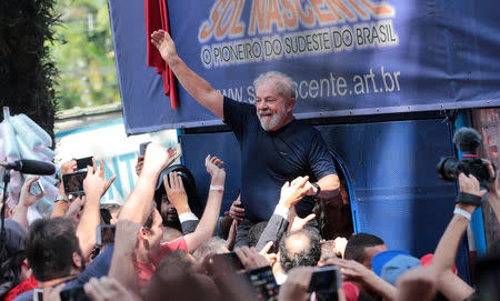 FILE PHOTO: Former Brazilian President Luiz Inacio Lula da Silva is carried by supporters in front of the metallurgic trade union in Sao Bernardo do Campo, Brazil April 7, 2018. REUTERS/Leonardo Benassatto/File photo