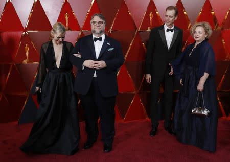 90th Academy Awards - Oscars Arrivals - Hollywood, California, U.S., 04/03/2018 - Director Guillermo del Toro and Writer Kim Morgan. REUTERS/Carlo Allegri