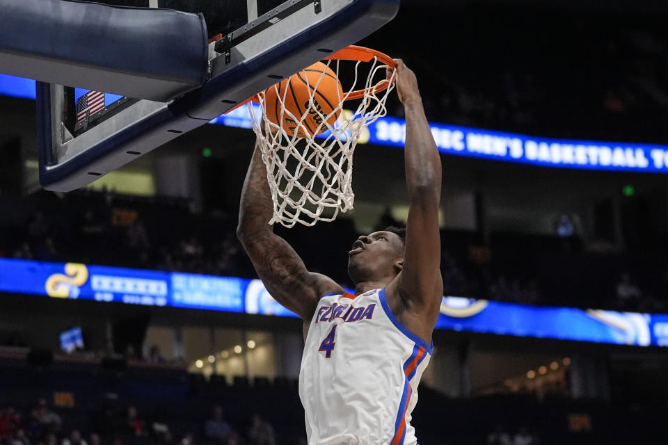 Florida forward Tyrese Samuel (4) scores against Georgia during the second half of an NCAA college basketball game at the Southeastern Conference tournament Thursday, March 14, 2024, in Nashville, Tenn. (AP Photo/John Bazemore)