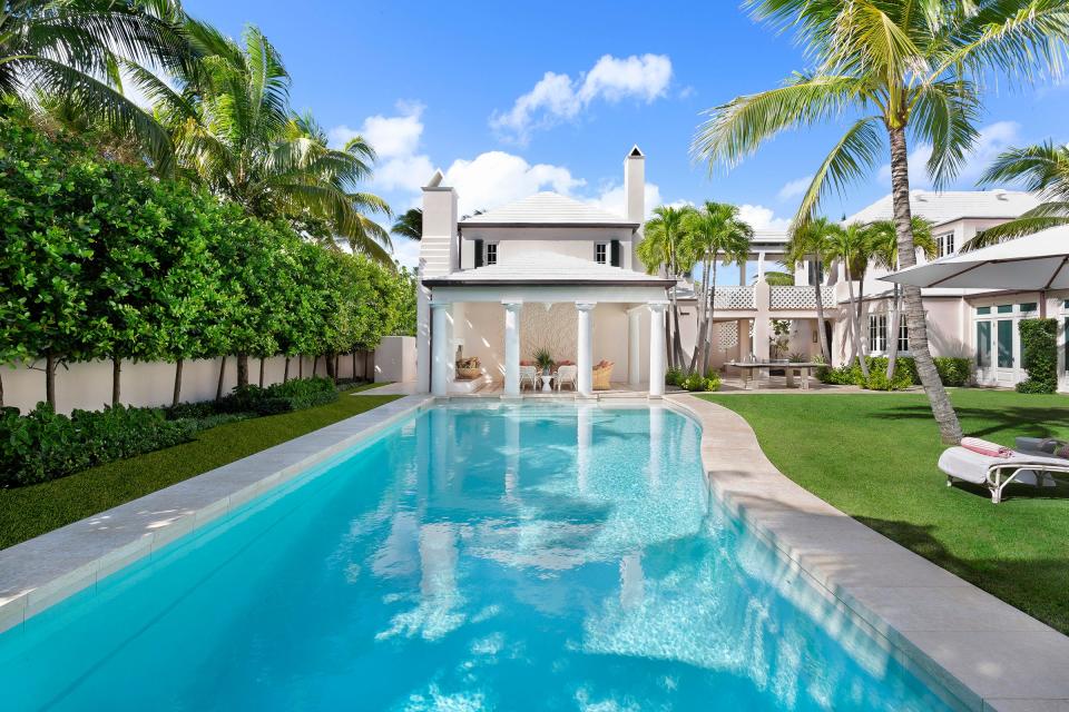 The four-bedroom house and two-bedroom guesthouse at 200 S. Ocean Blvd. in Palm Beach face the swimming pool on the west side of the estate. The property just entered the market at $59 million.