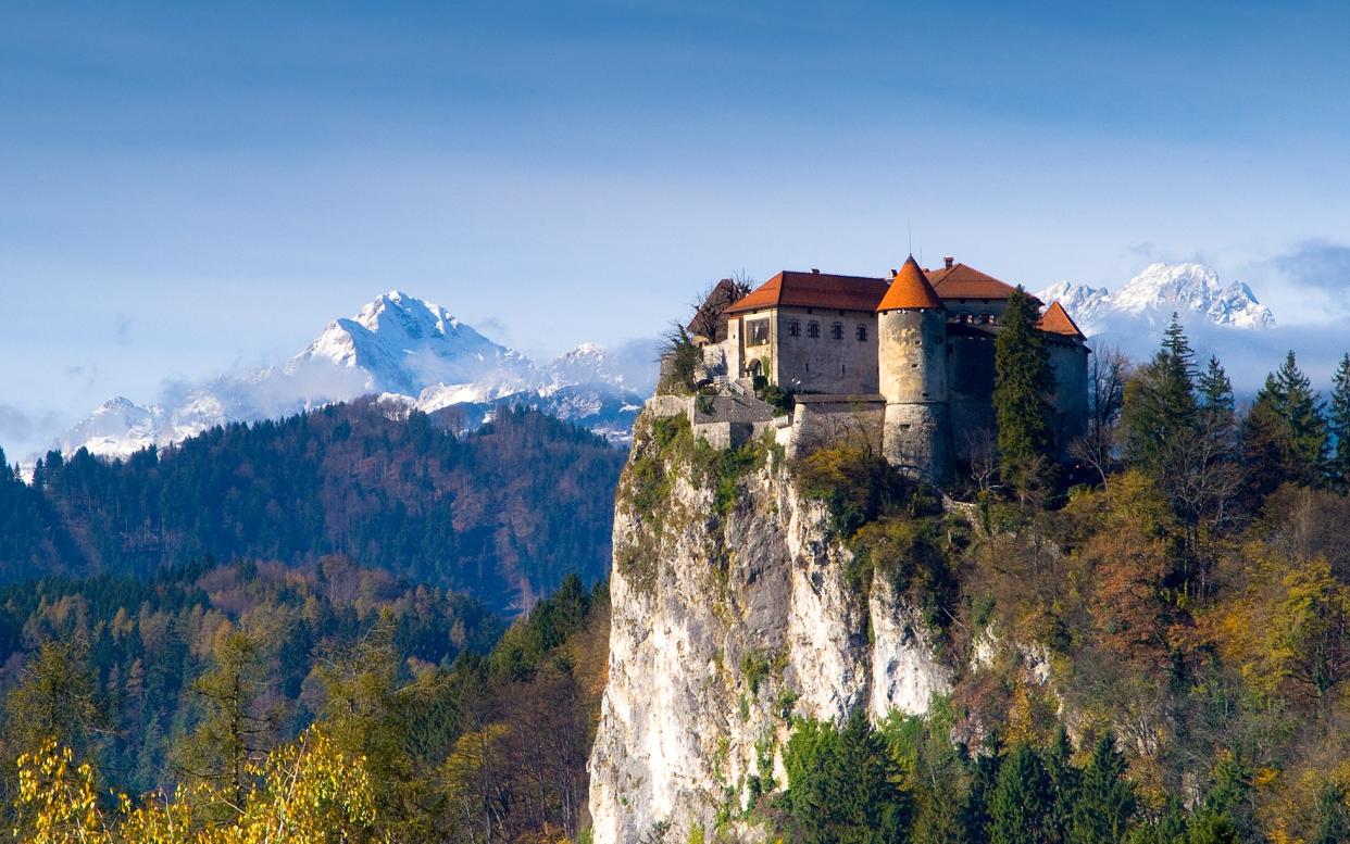 Myths and legends: Bled Castle hangs high over the lake in north-west Slovenia