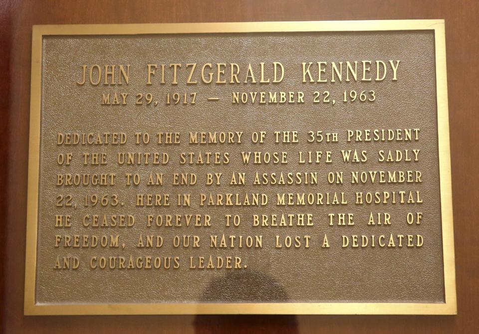 In this photo made Thursday, Nov. 7, 2013, a plaque tell the history of the death of President John F. Kennedy on Nov. 22, 1963, at Parkland Memorial Hospital in Dallas. (AP Photo/LM Otero)