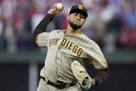 San Diego Padres relief pitcher Robert Suarez throws during the seventh inning in Game 5 of the baseball NL Championship Series between the San Diego Padres and the Philadelphia Phillies on Sunday, Oct. 23, 2022, in Philadelphia. (AP Photo/Brynn Anderson)