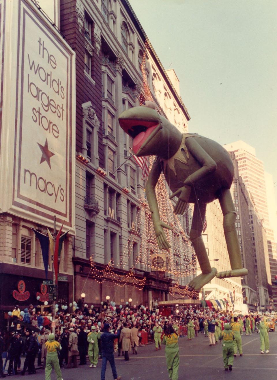 A Kermit the Frog balloon in the macy's thanksgiving day parade in 1977