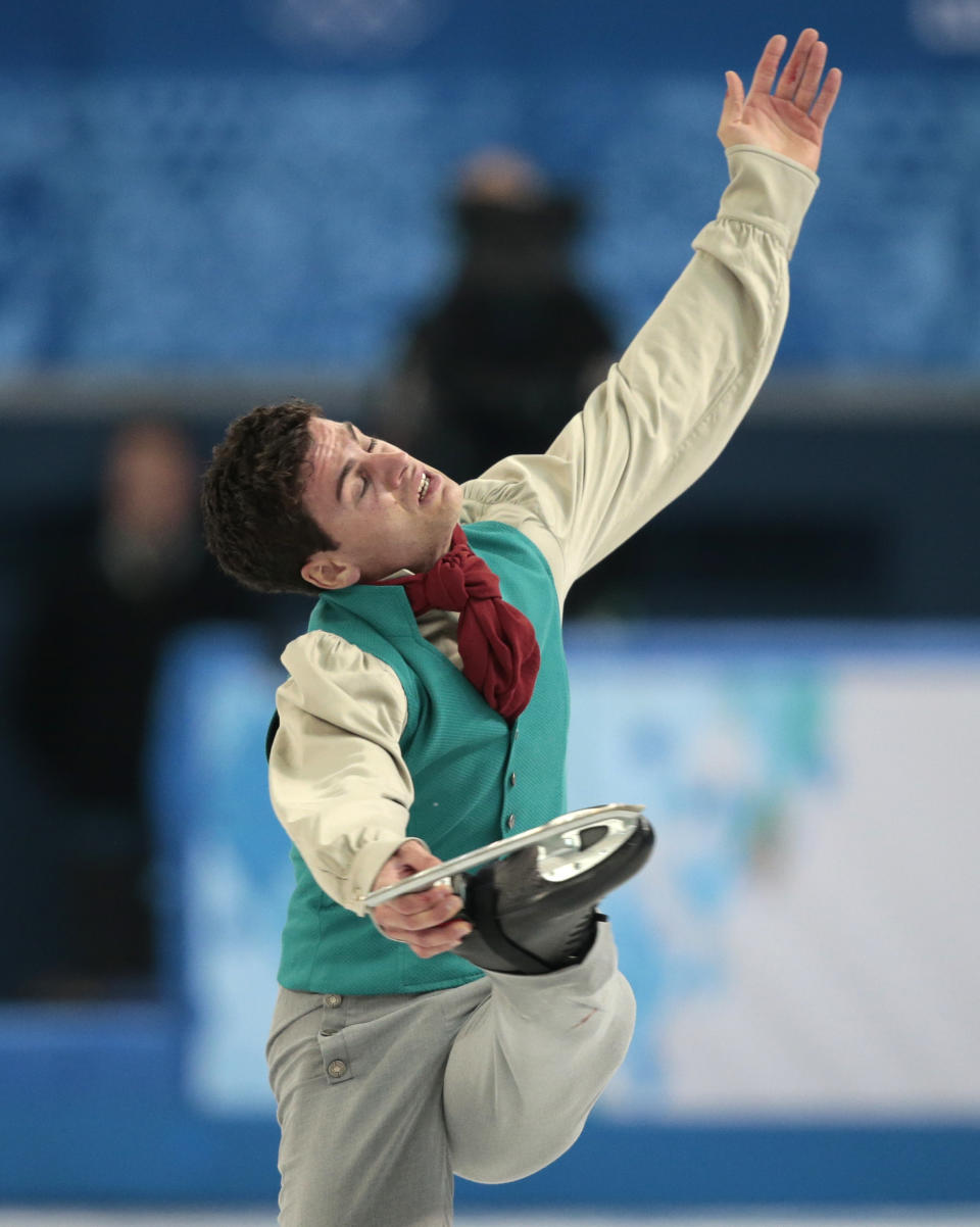 Javier Raya of Spain competes in the men's short program figure skating competition at the Iceberg Skating Palace during the 2014 Winter Olympics, Thursday, Feb. 13, 2014, in Sochi, Russia. (AP Photo/Ivan Sekretarev)