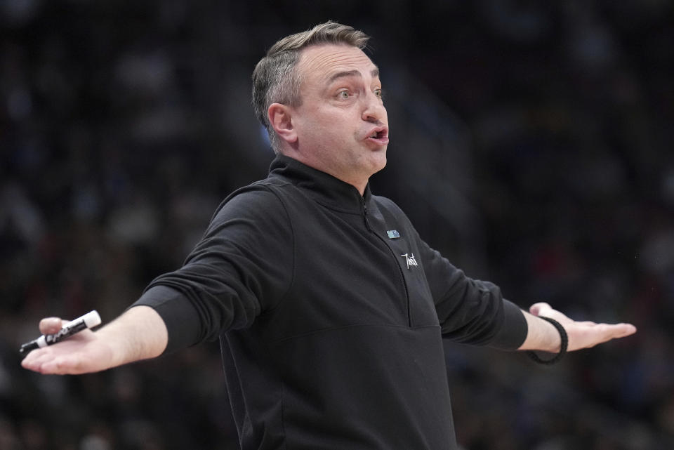 Toronto Raptors head coach Darko Rajakovic expresses his displeasure with officials during the second half of an NBA basketball game against the Brooklyn Nets in Toronto, Monday, March 25, 2024. (Nathan Denette/The Canadian Press via AP)