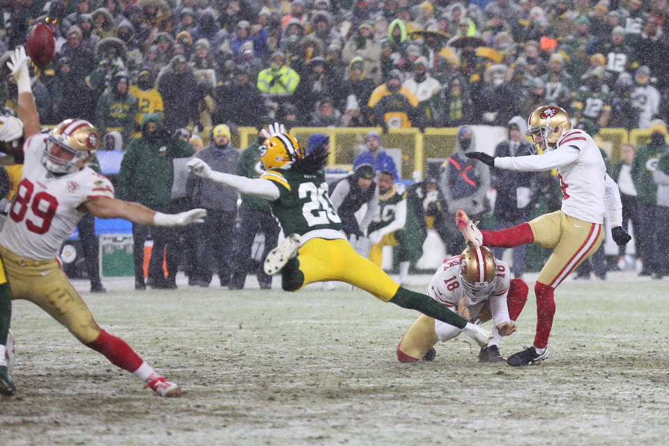 San Francisco 49ers kicker Robbie Gould kicks a game winning field goal during the NFC Divisional playoff game between the Green Bay Packers and the San Francisco 49ers at Lambeau Field.