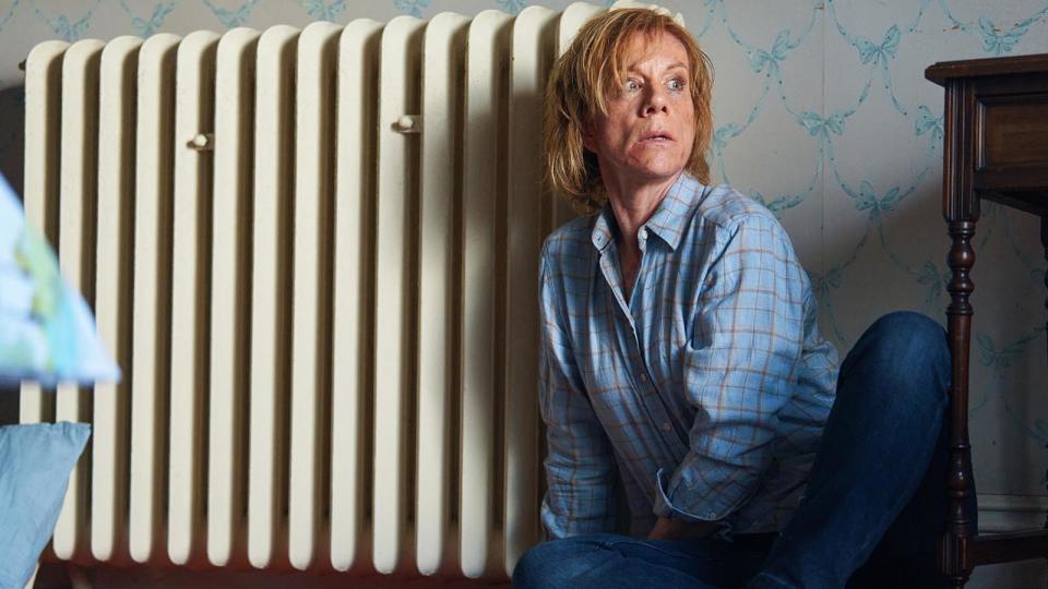 Juliet Stevenson by a radiator in BBC One drama Wolf