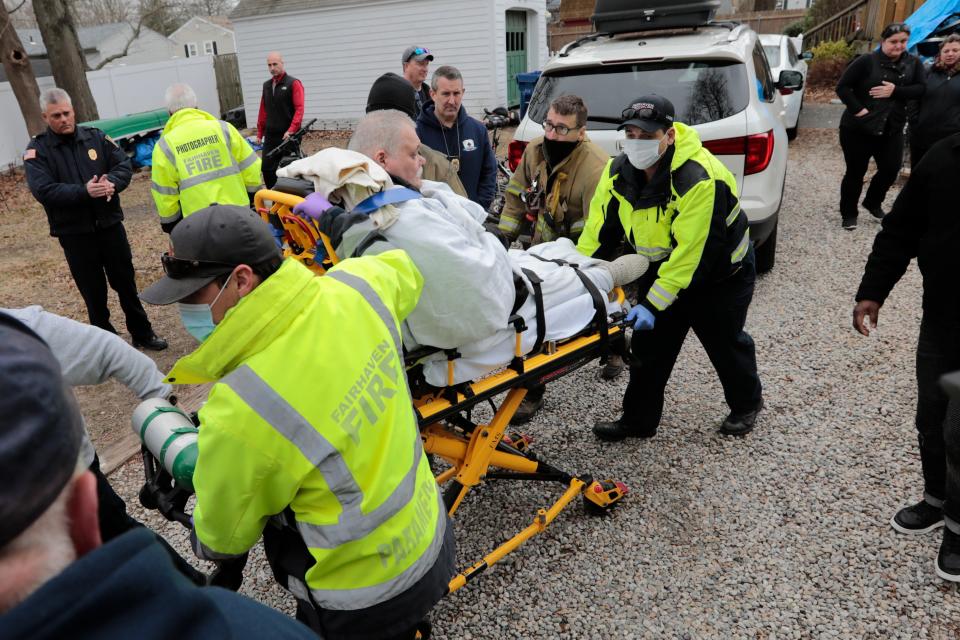 Fairhaven firefighters cart Kenneth Parks into an ambulance on March 18, 2021, after he was found sitting in a vehicle on Chestnut Street in Fairhaven. Parks, 73, who wandered away from his day group in Cushman Park was found safe the next day — almost 22 hours after he was reported missing.
